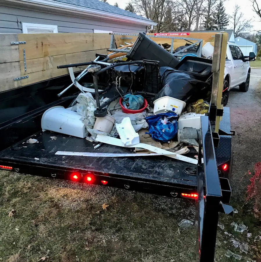 Roll-off dumpster delivered to a residential driveway in Greenbelt